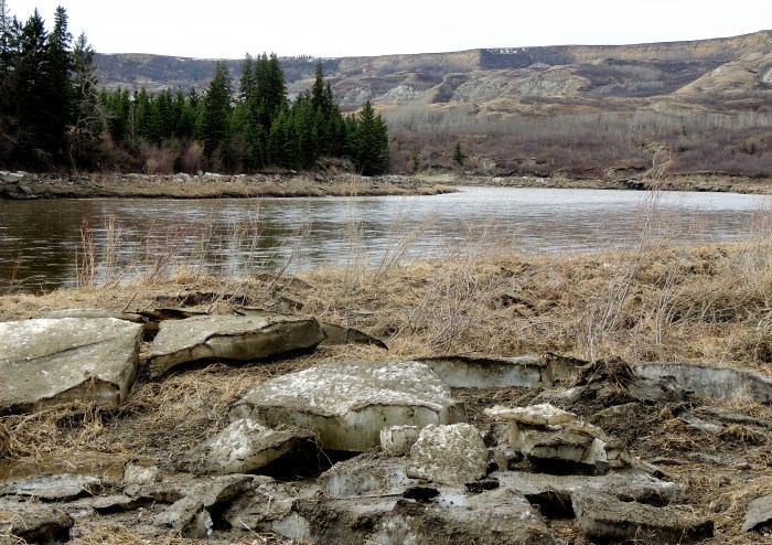 Hiking down to the river valley, with the buffalo jump in the distance. 